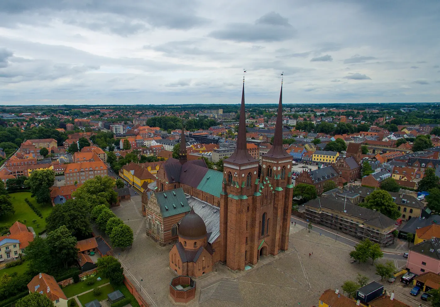 Aerial view of Roskilde Cathedral’s twin spires above the town