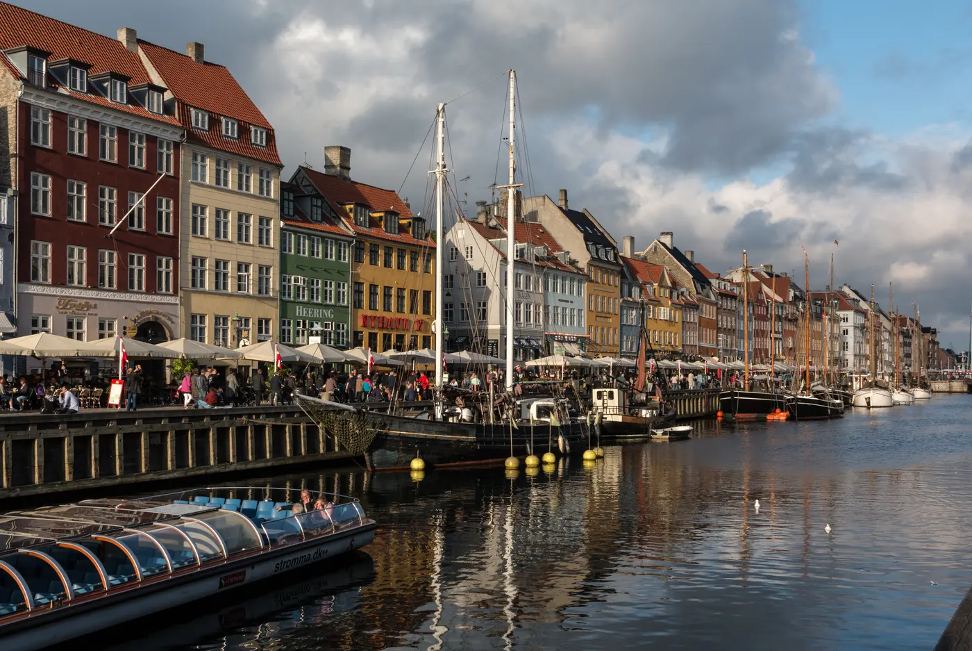 Wooden sailing ships and boats moored at Nyhavn, Copenhagen
