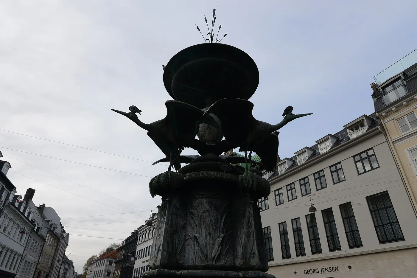 The Stork Fountain at Amagertorv square on Strøget, with the Georg Jensen store behind