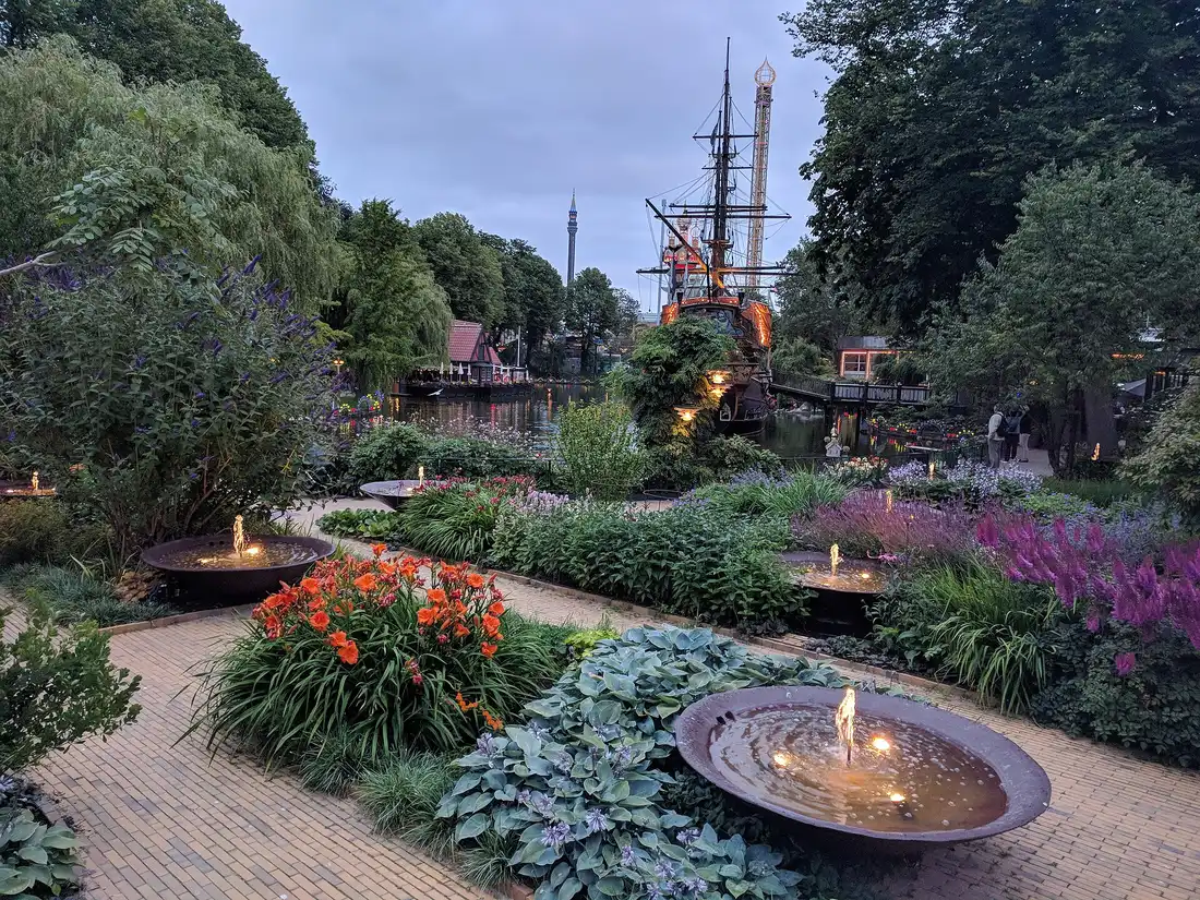Flower beds and the boating lake in Tivoli Gardens